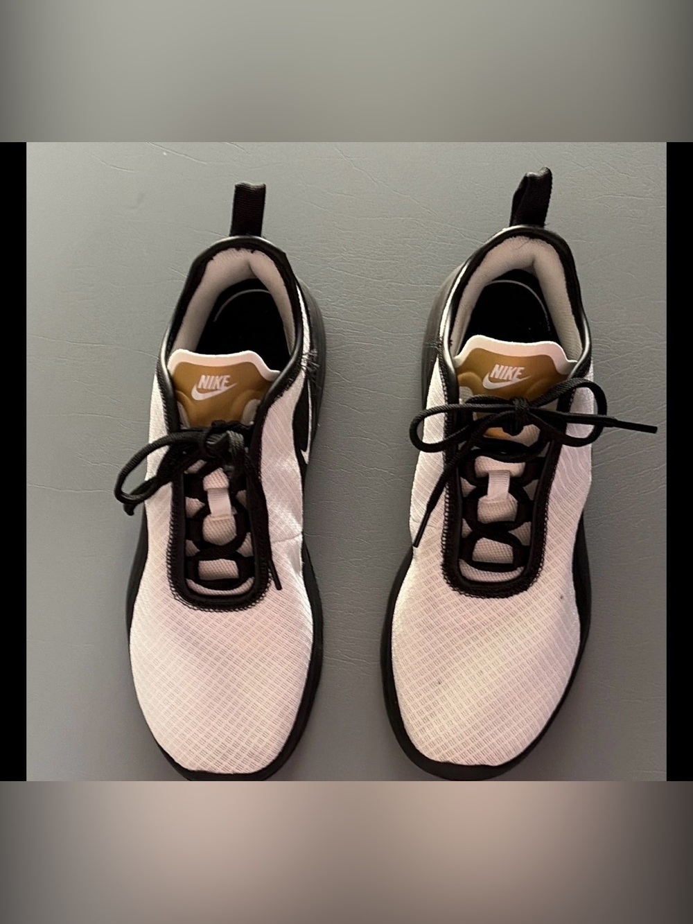 Nike Men’s White and Black Athletic Running Shoes with Gold Tongue Logo